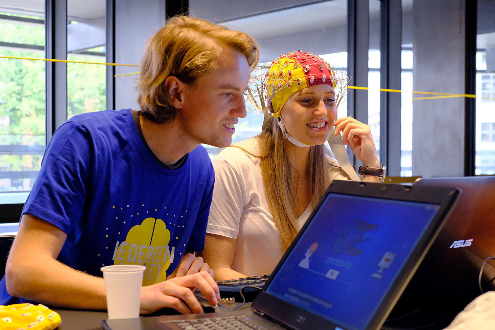 two people doing a EEG test